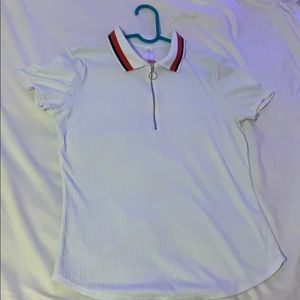 white shirt with blue and red collar